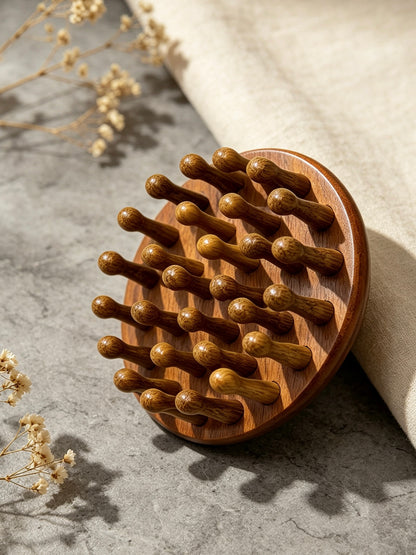 Round Head Massage Comb angled view with dried flowers