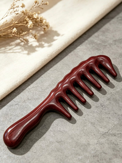 Wide Tooth Comb on fabric with dried flowers
